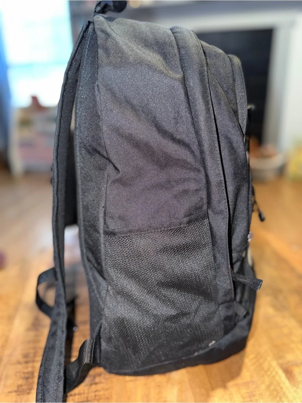 Nike Black Backpack with White Swoosh Graphic and Elastic Bungee